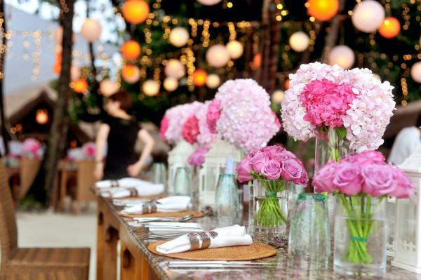 table-with-plates-and-flowers-filed-neatly-selective-focus-169190.jpg